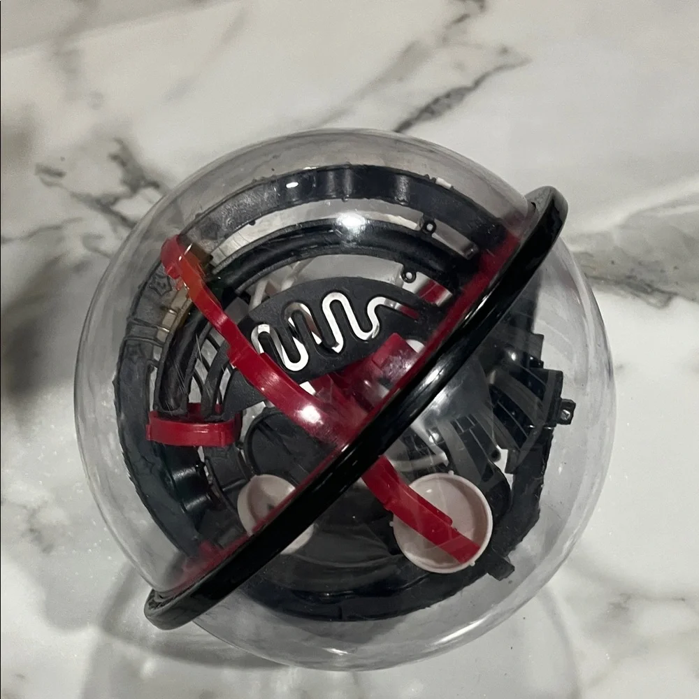 Perplexus Ball puzzle Interactive Red and Black Puzzle Sphere sharper‎ image